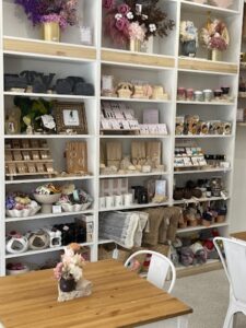 Remnscnt cafe Glen Huntly display of earrings, candles, dried flowers