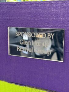 Planter box with silver plaque sponsored by Glen Huntly Revival group